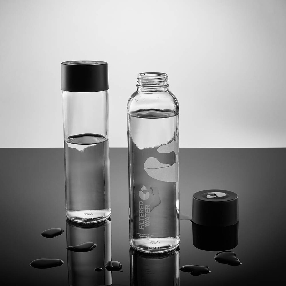 Butelki z logo – nilo glass bottle with gpi lid. made in portugal – transparent ABT021_110-amb Nilo glass bottle with GPI lid. Made in Portugal - Transparent ABT021_110-amb