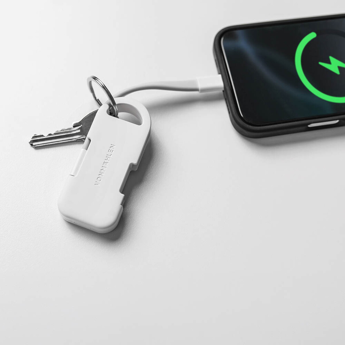 Powerbanki z logo – evergreen go 2-in1 keyring with powerbank. rtpe. led indicator – white APW009_106-amb-E Evergreen Go 2-in1 keyring with powerbank. rTPE. LED indicator - White APW009_106-amb-E
